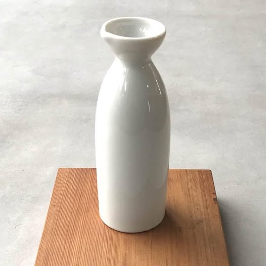The porcelain tokkuri flask is for serving chilled and hot sake