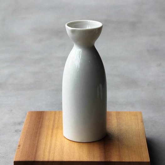 The porcelain tokkuri flask is for serving chilled and hot sake
